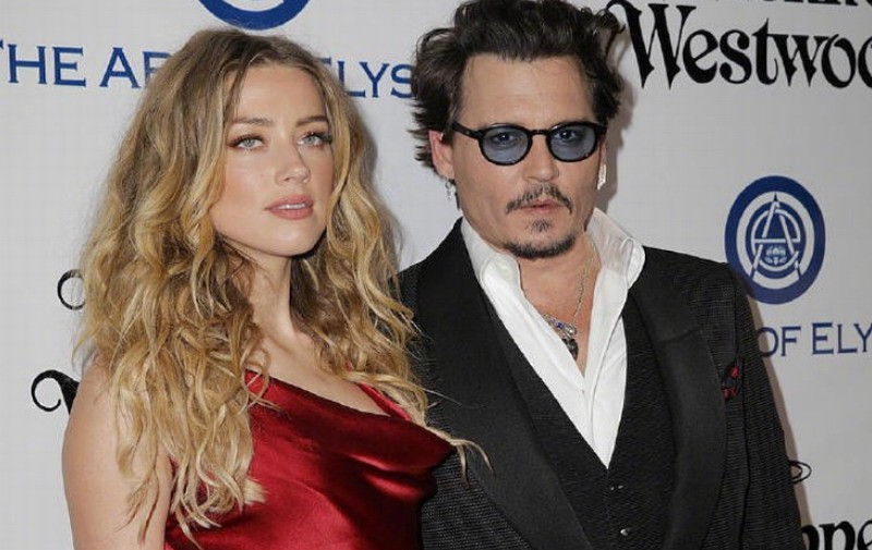 艾美柏宣布与Depp和解。我做了一个非常困难的决定。